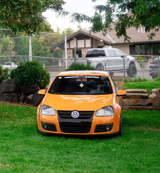 Wasatch Euro Fest windshield banner on a VW GTI