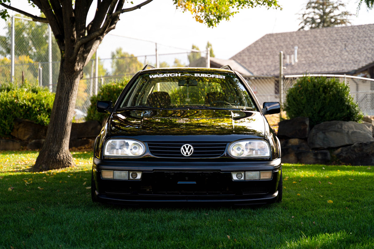 Wasatch Euro Fest windshield banner on a VW Golf